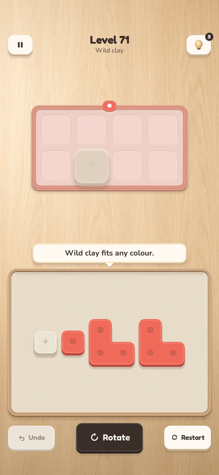 Level 71 'Wild clay': a coral mat with one wild clay cell and coral tiles plus a wild tile in the tray.