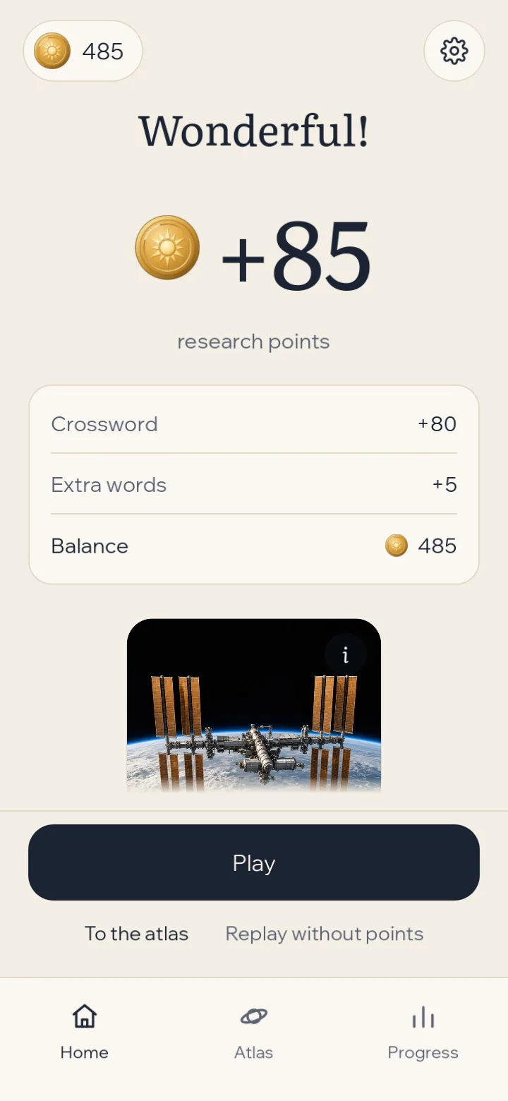 The result screen: Wonderful! +85 research points, from the crossword and one extra word, above a space fact.